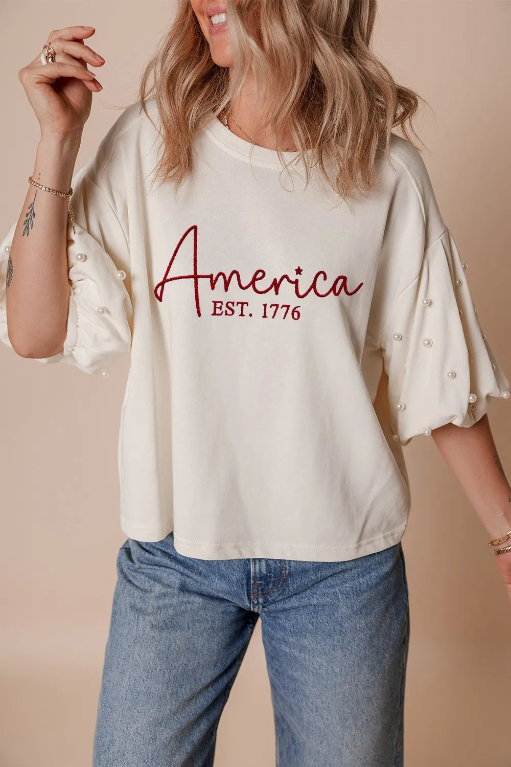 AMERICA EST 1776 Embroidered Pearl Beaded Sleeve T Shirt - Product side view by Simply Love