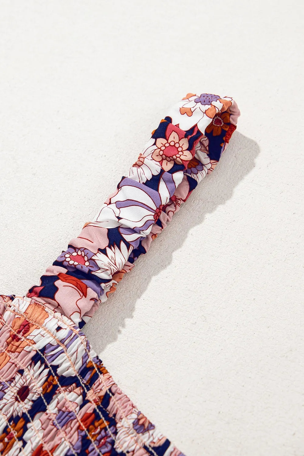 Bloom & Breeze Floral Smocked Jumpsuit