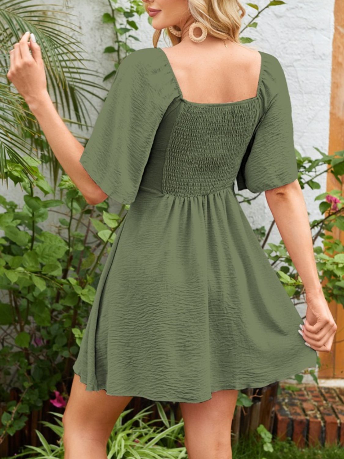 Breezy Charm Smocked Flutter Dress