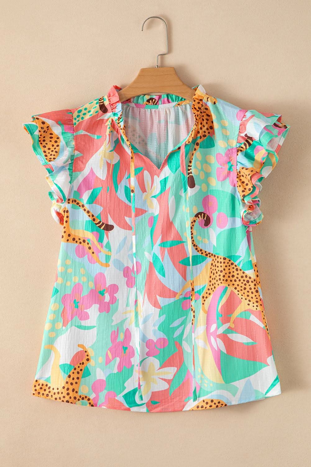 Floral green tie-neck blouse