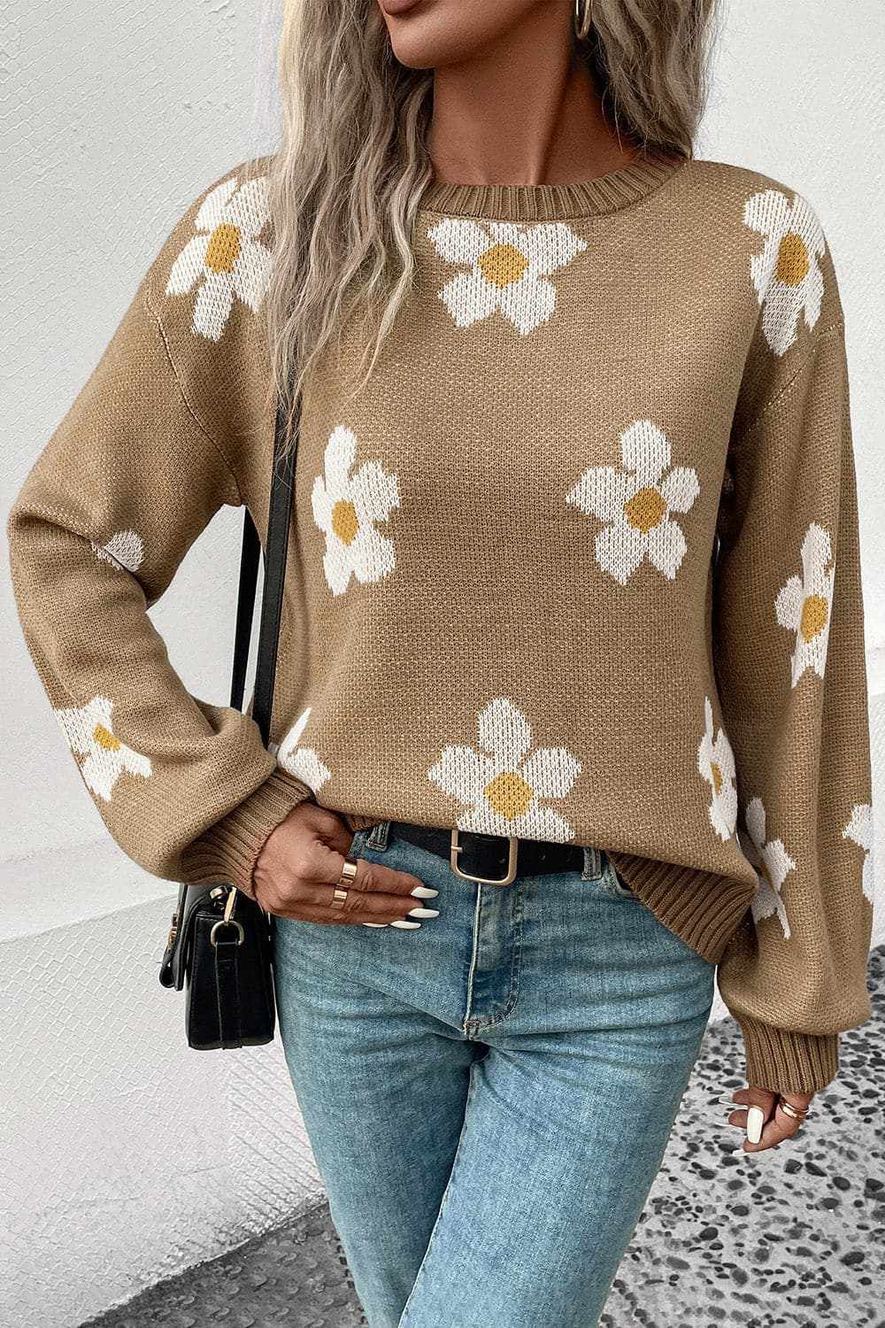 Floral oversized acrylic sweater with a white flower pattern.
