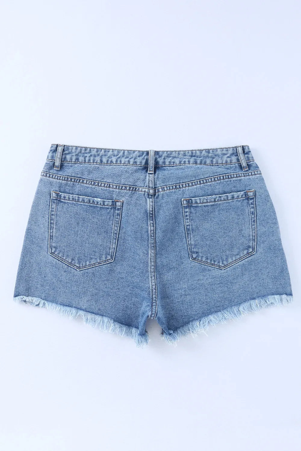 Crossover Cutie High Rise Distressed Denim Shorts