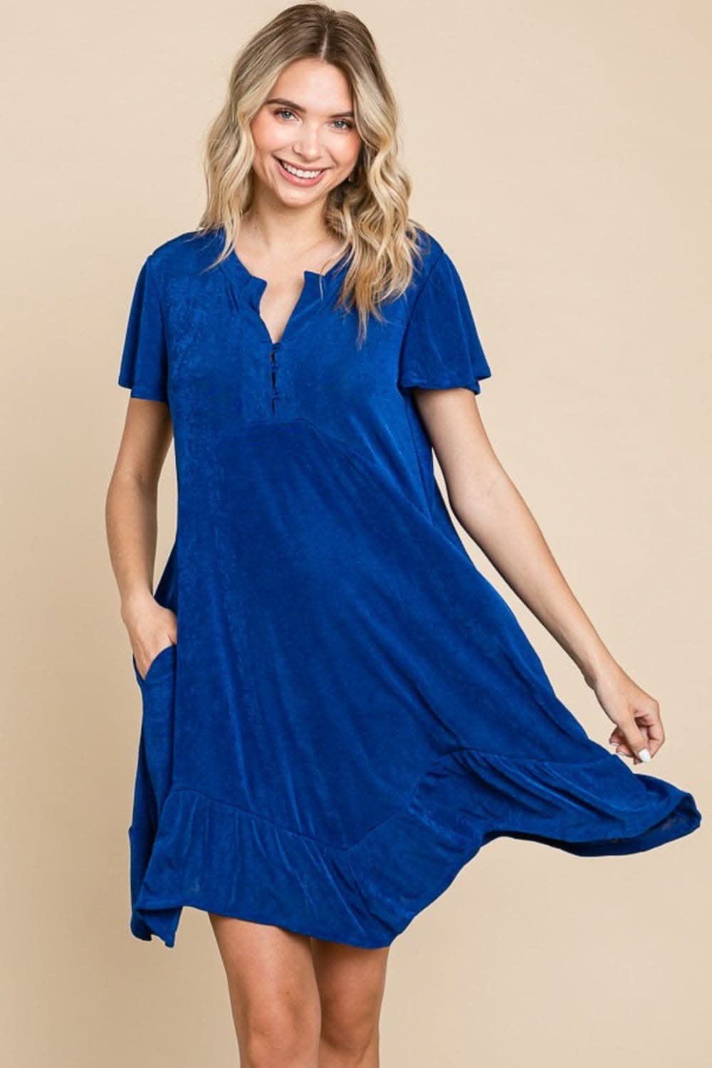 Blue Culture Code ruffled hem dress with pocketed design.