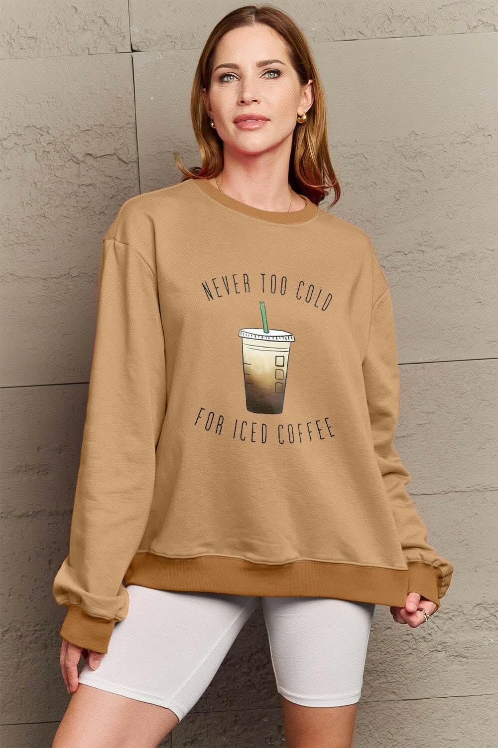 Simply Love Full Size NEVER TOO COLD FOR ICED COFFEE Round Neck SweatsStay Cozy in Style with the Simply Love Full Size Round Neck Sweatshirt
Indulge in comfort and warmth without compromising on style with our Never Too Cold For IcedLove Salve ICED COFFEE Round Neck Sweatshirtplus