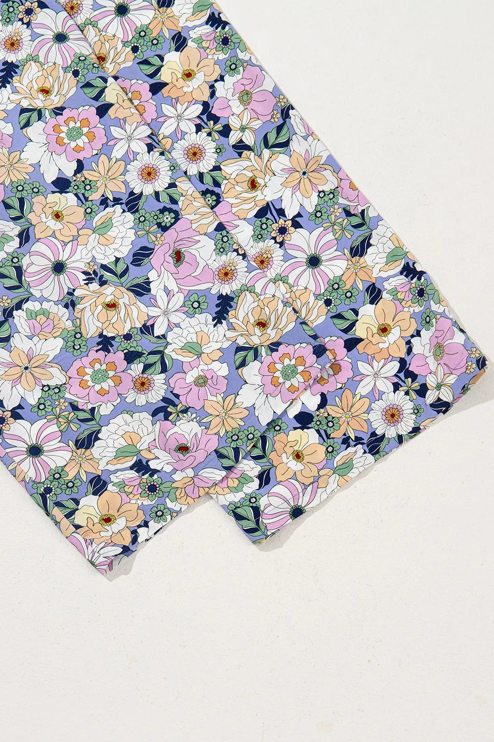 Bloom & Breeze Floral Smocked Jumpsuit