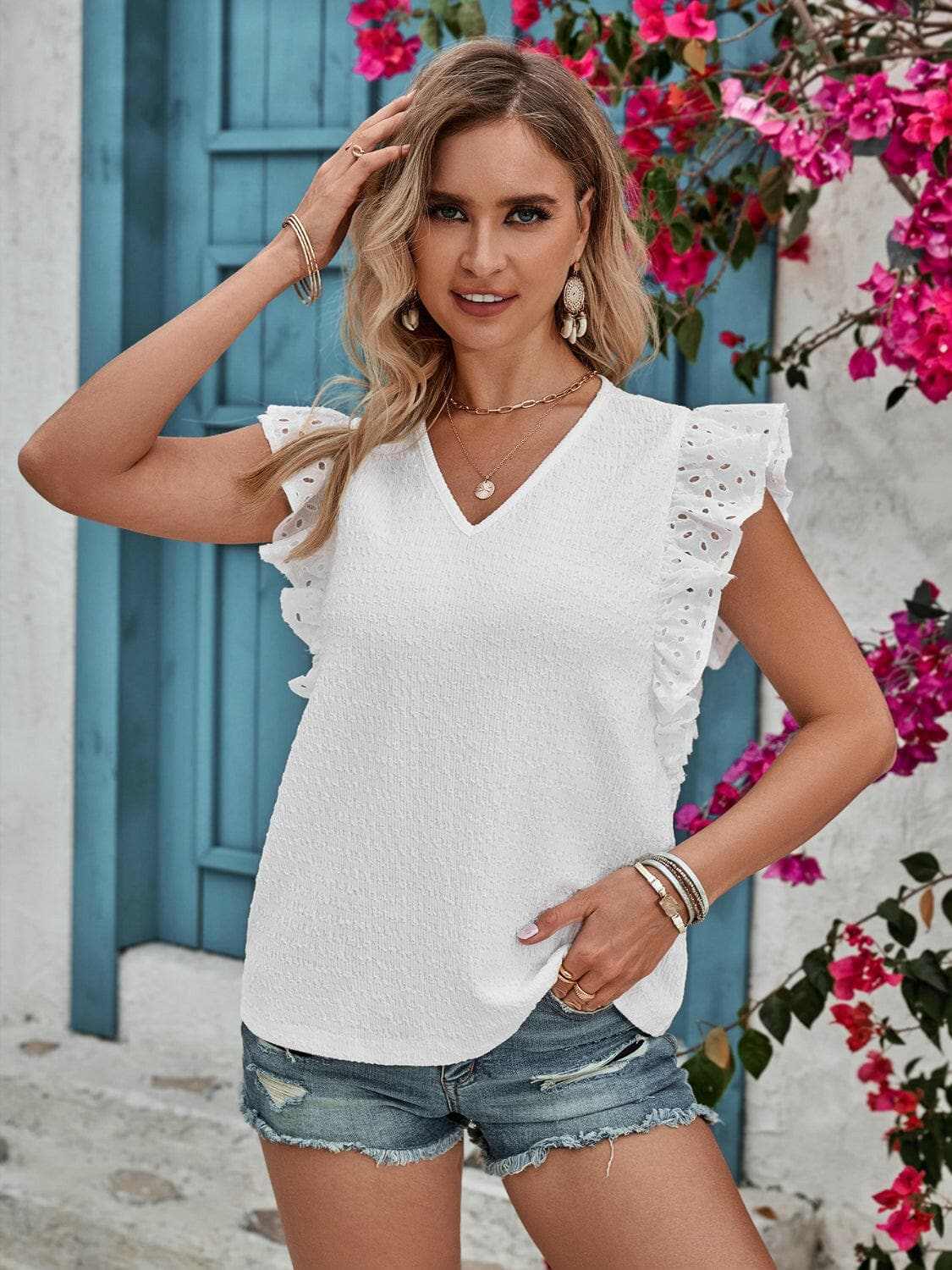Ruffled V-Neck Cap Sleeve BlouseUpgrade Your Style with the Ruffled V-Neck Cap Sleeve Blouse
Step into elegance with our Ruffled V-Neck Cap Sleeve Blouse, a versatile piece that combines sophisticLove Salve -Neck Cap Sleeve Blousejust arrived