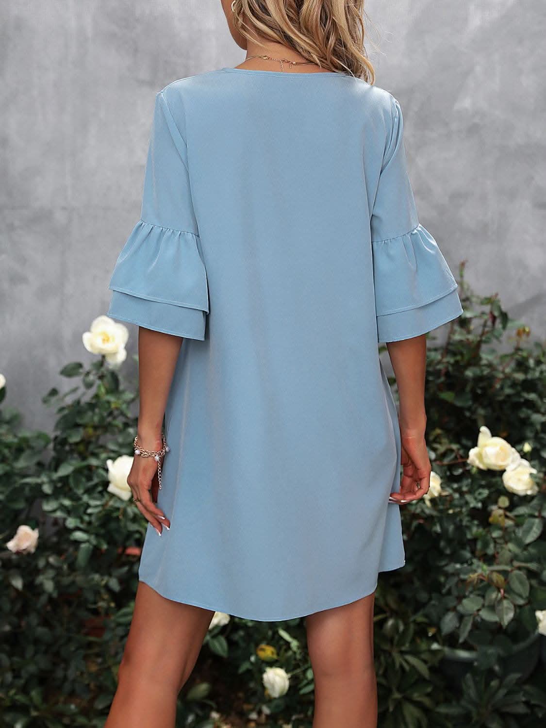 Chic V-neck Mini Dress with Ruffles and Elegant Detail