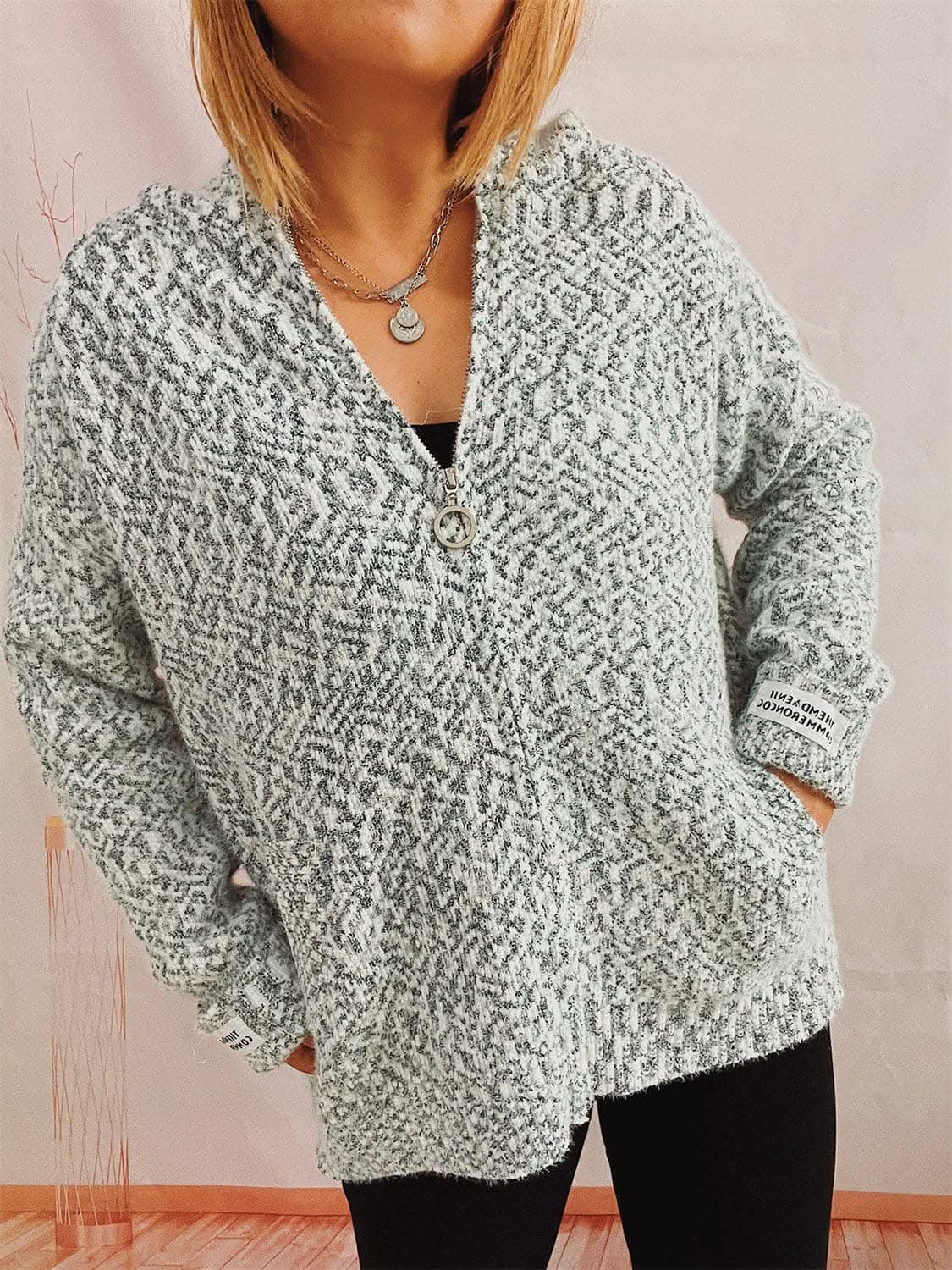 Cozy zip-up hooded sweater with pockets
