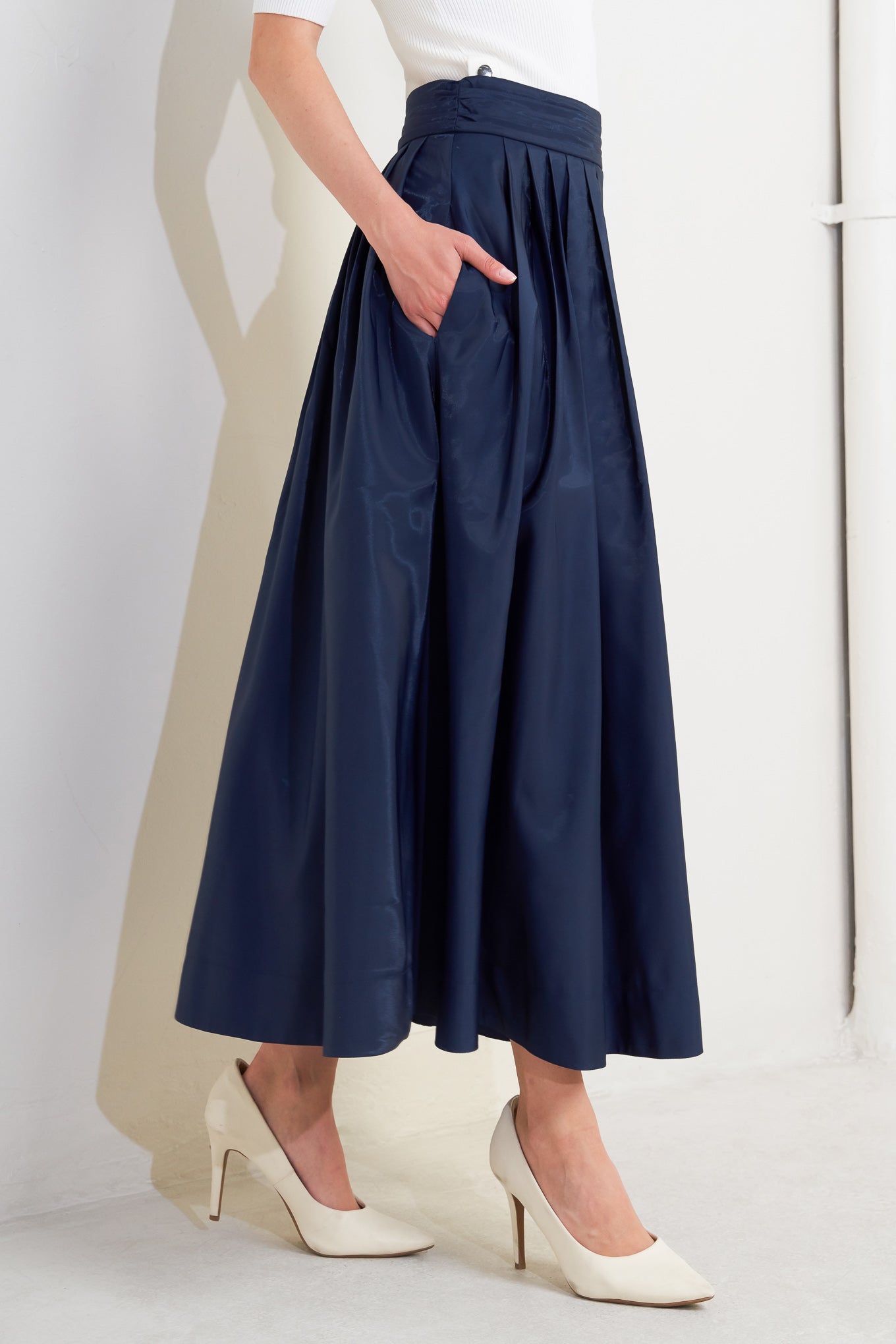 LUXE FLARE WOVEN PLEATED MINI SKIRT