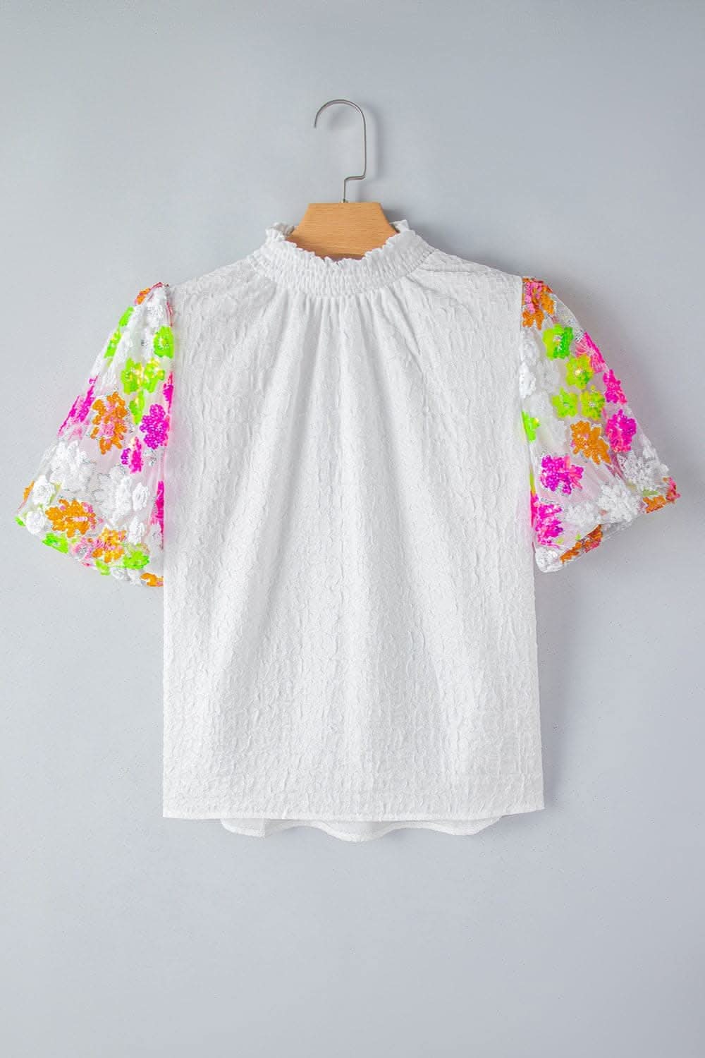 Floral sequin mock neck blouse
