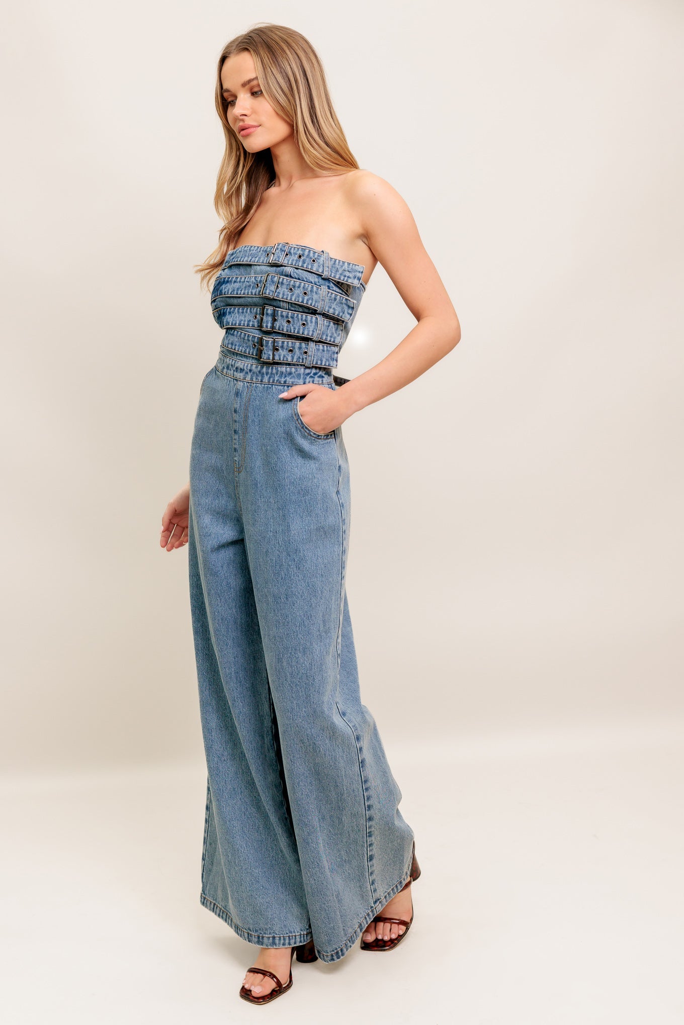 Urban Harness Strapless Denim Jumpsuit With Front Buckles