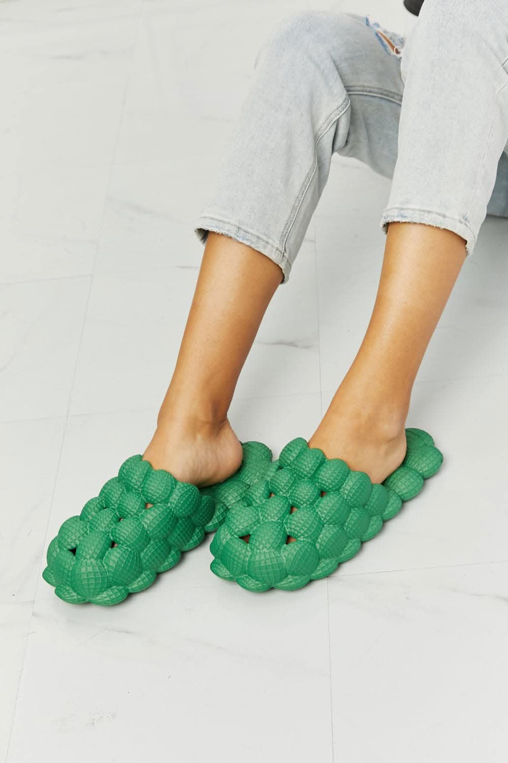 Nook Joi green bubble slides for comfort