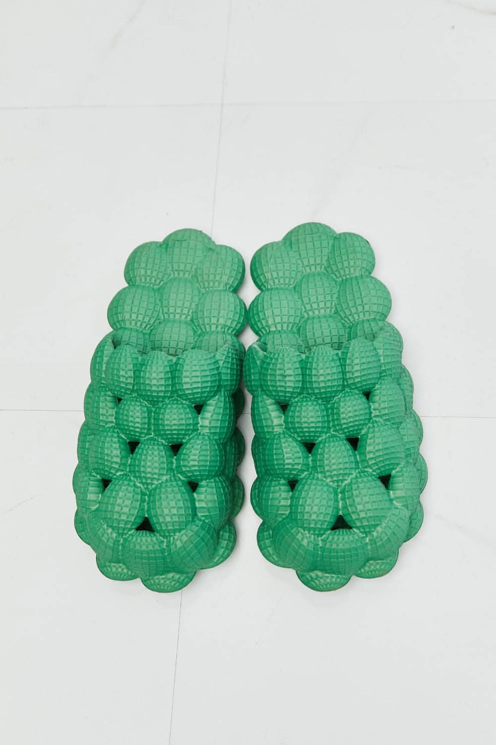 Nook Joi green bubble slides for comfort