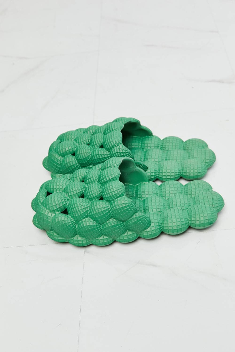 Nook Joi green bubble slides for comfort