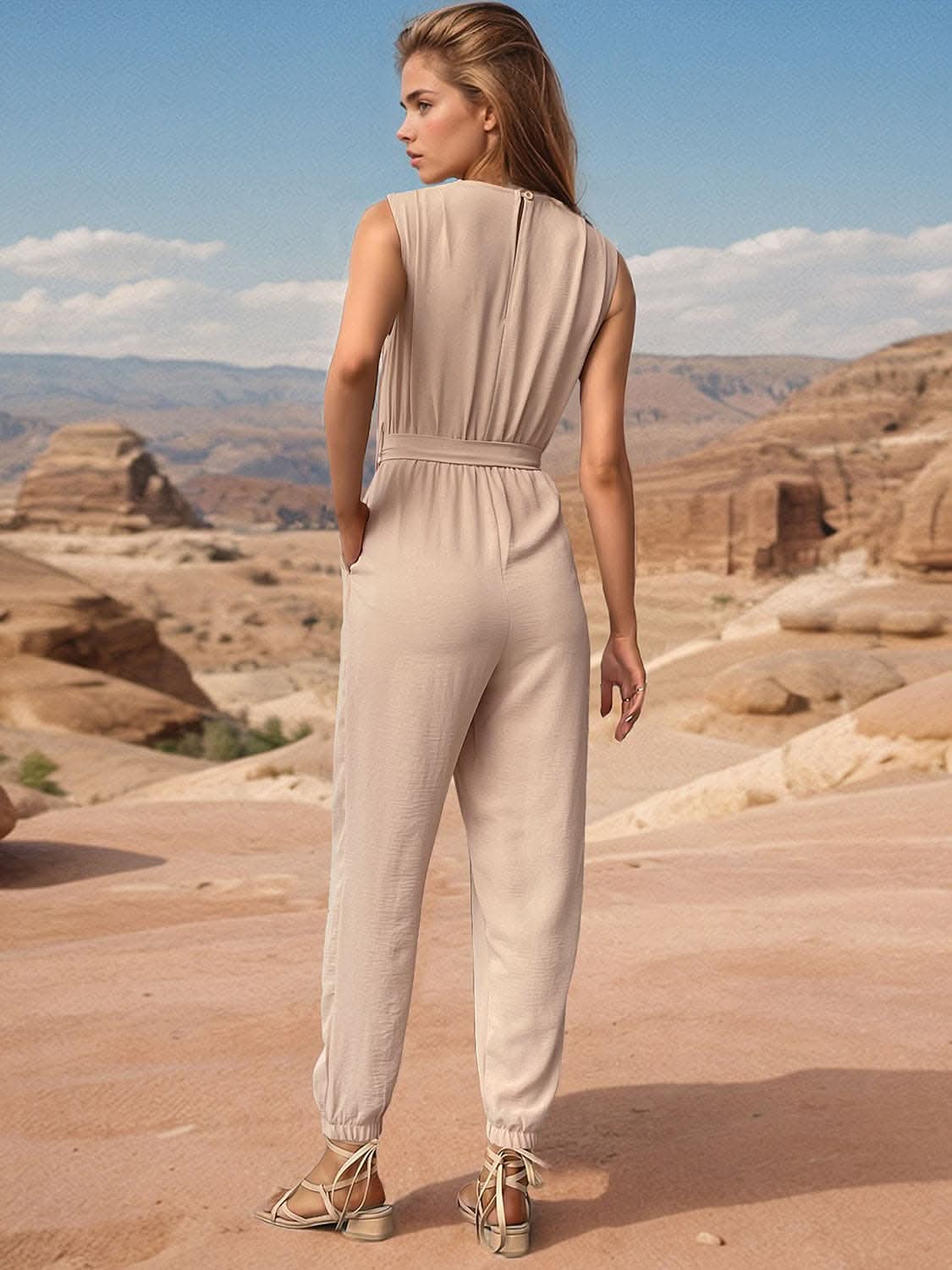 Tied surplice jumpsuit with sheer accents