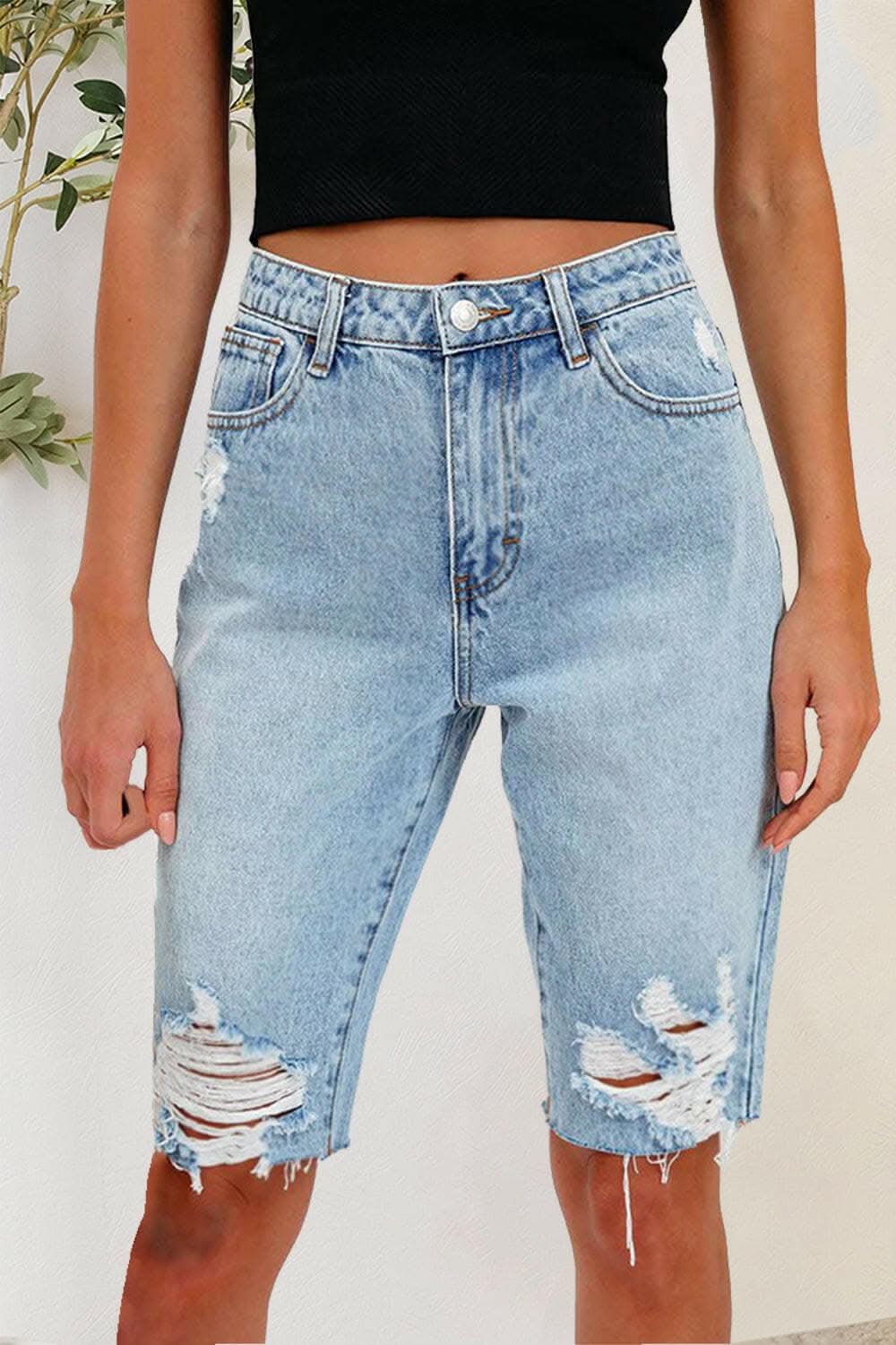 Trendy distressed denim shorts