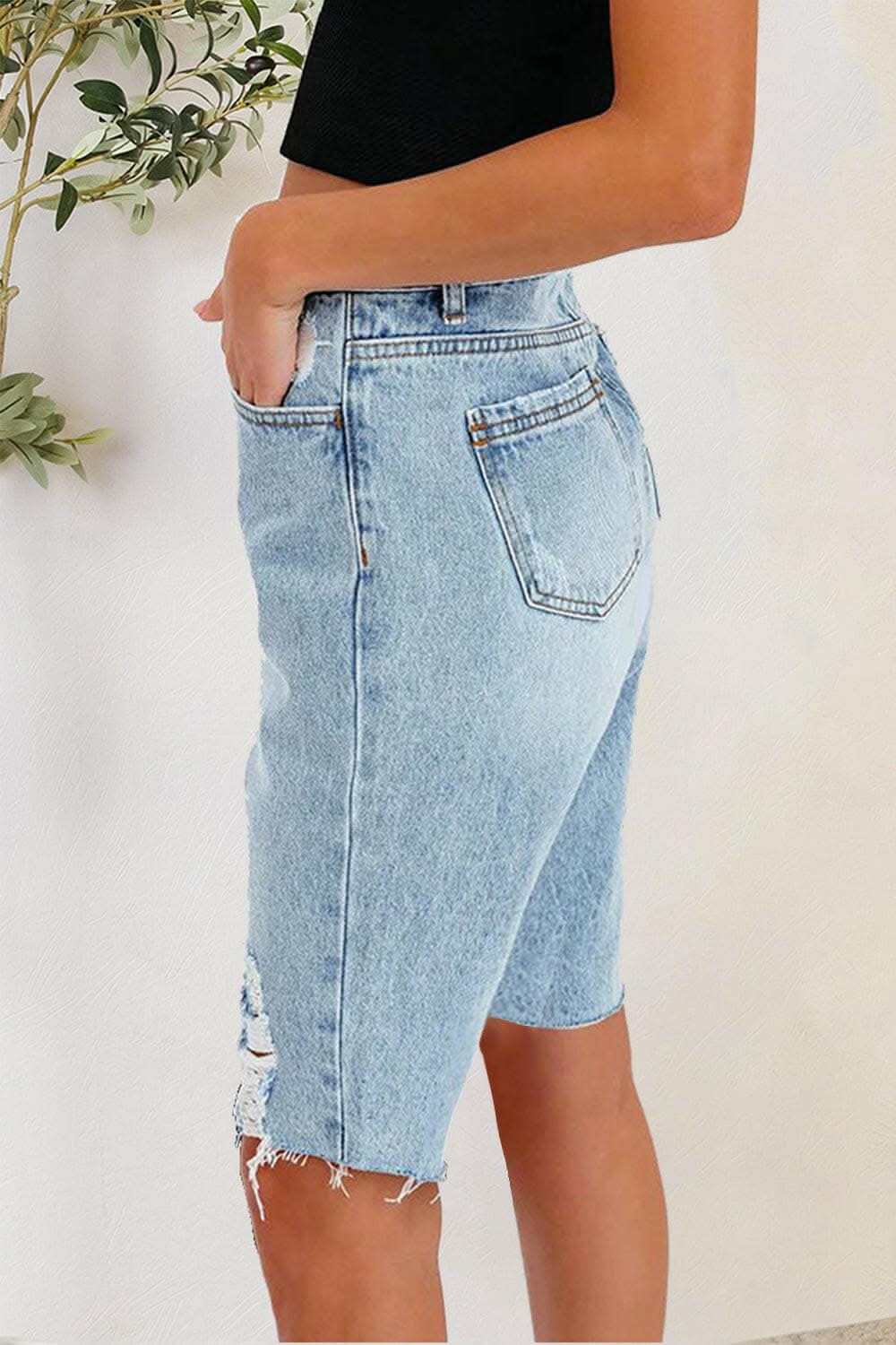 Trendy distressed denim shorts