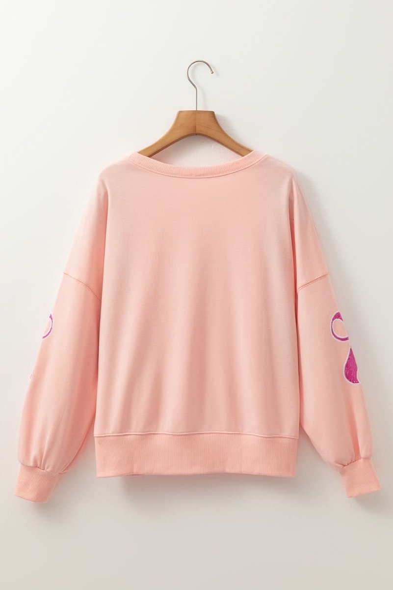 Apricot Pink Sequined Bowknot Drop Shoulder Oversized Sweatshirt - Love Salve