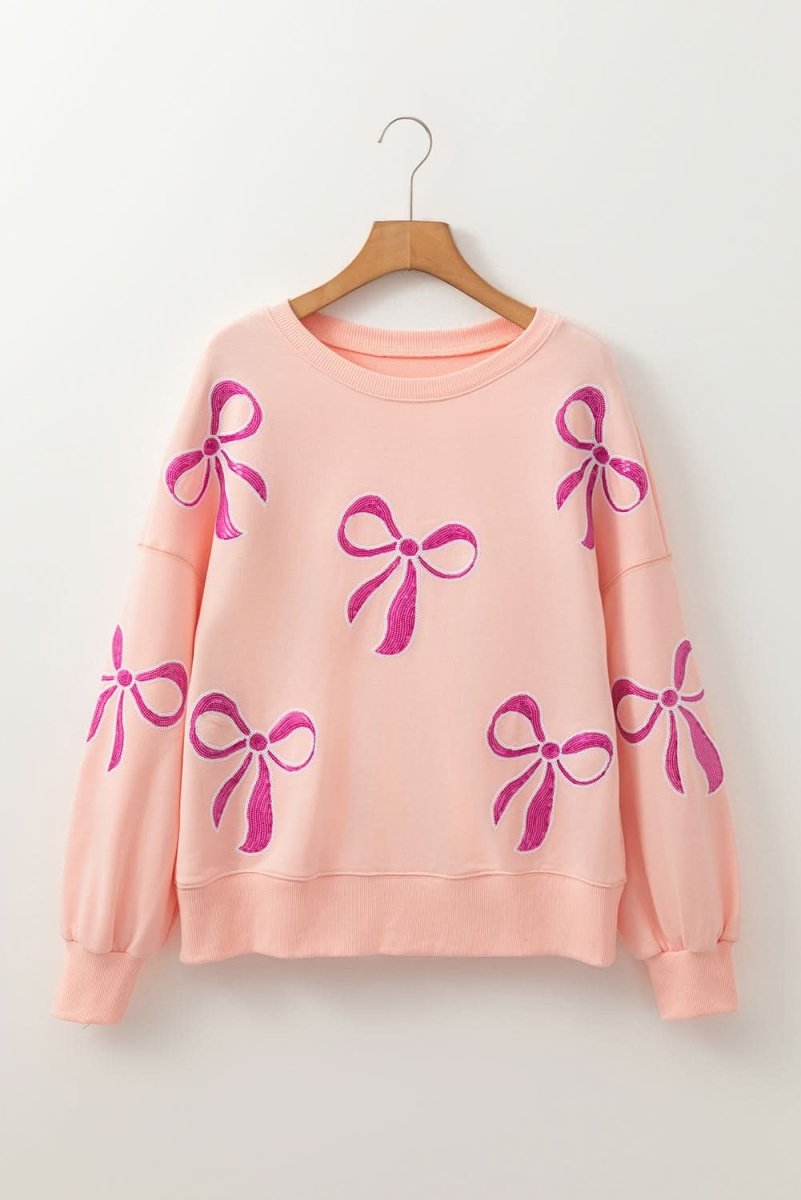 Apricot Pink Sequined Bowknot Drop Shoulder Oversized Sweatshirt - Love Salve