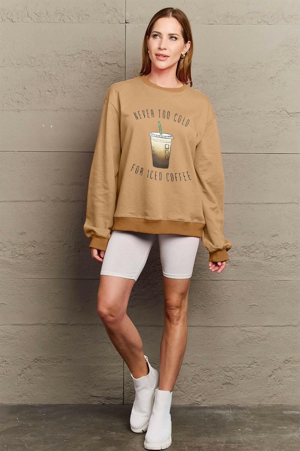 Simply Love Full Size NEVER TOO COLD FOR ICED COFFEE Round Neck SweatsStay Cozy in Style with the Simply Love Full Size Round Neck Sweatshirt
Indulge in comfort and warmth without compromising on style with our Never Too Cold For IcedLove Salve ICED COFFEE Round Neck Sweatshirtplus