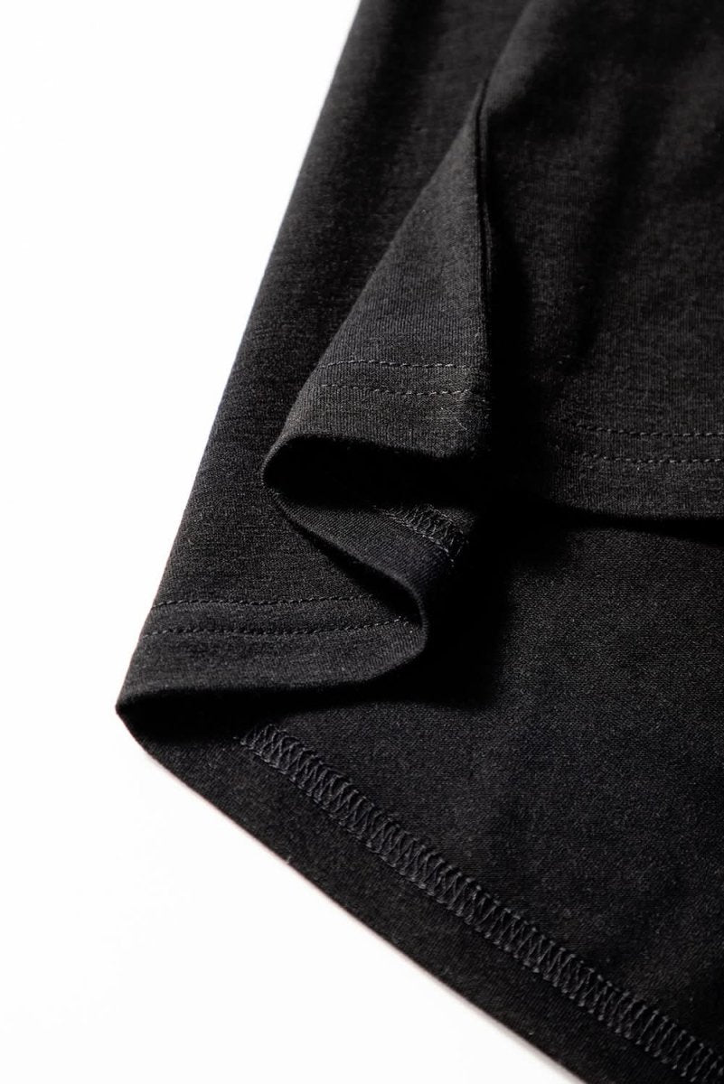 Chic Black Peekaboo Wide Leg Jumpsuit with Square Neck and Sleeveless Design - Love Salve
