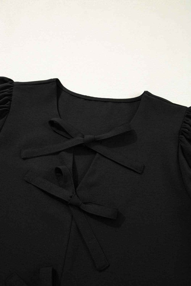 Chic Black Peplum Blouse with Puff Sleeves and Bowknot Detail - Love Salve