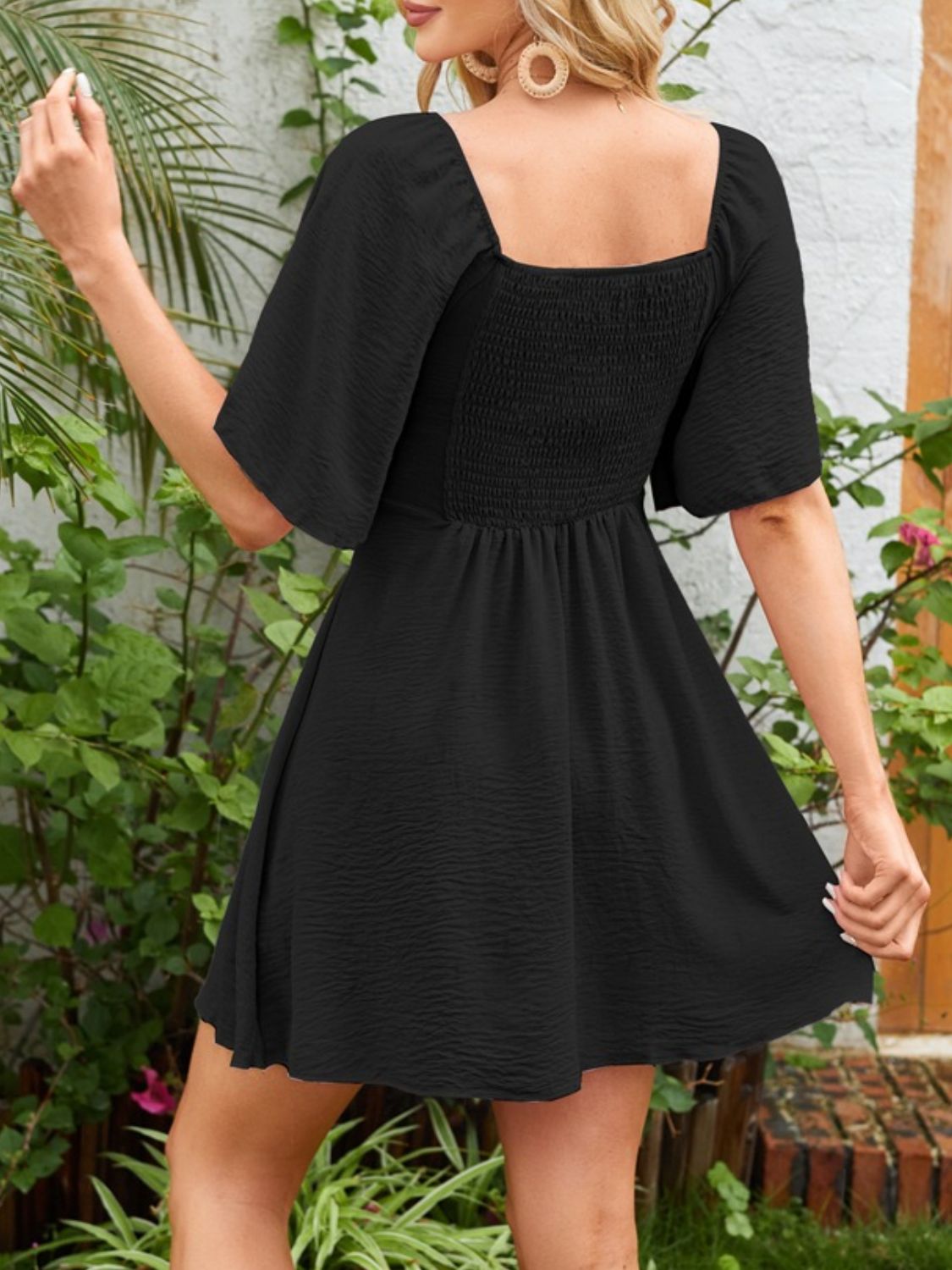 Breezy Charm Smocked Flutter Dress