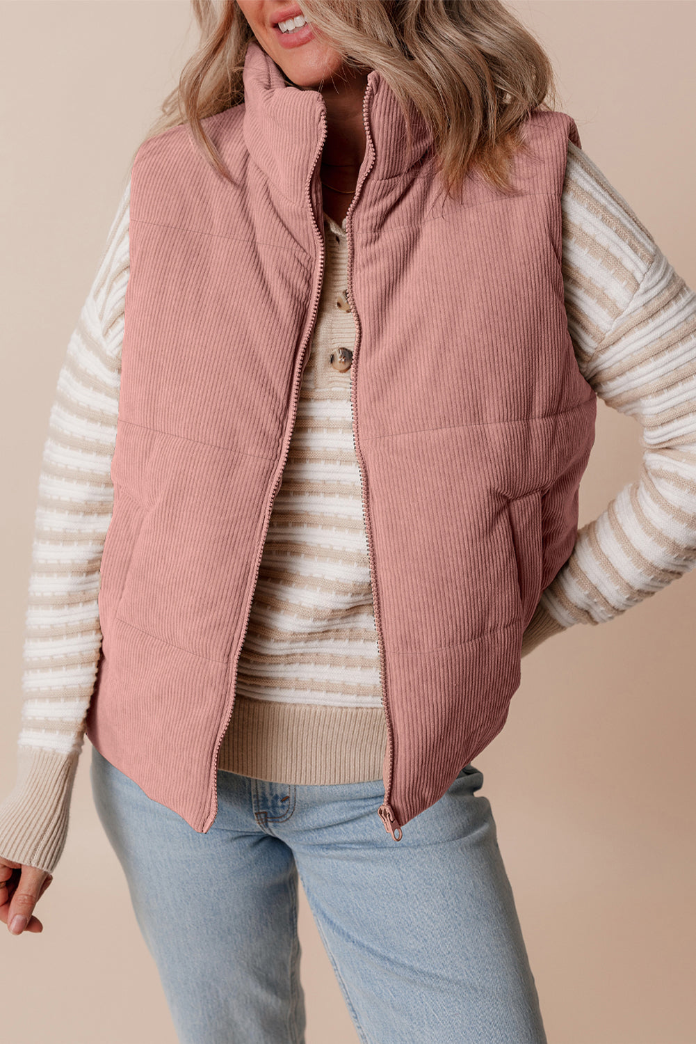 Apricot Pink Corduroy Stand Neck Zipped Puffer Vest by De...