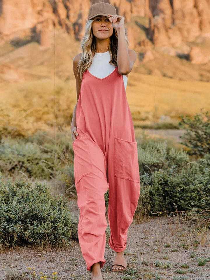 Elegant v-neck jumpsuit with pockets in a luxe blend fabric, showcasing effortless style and comfort.