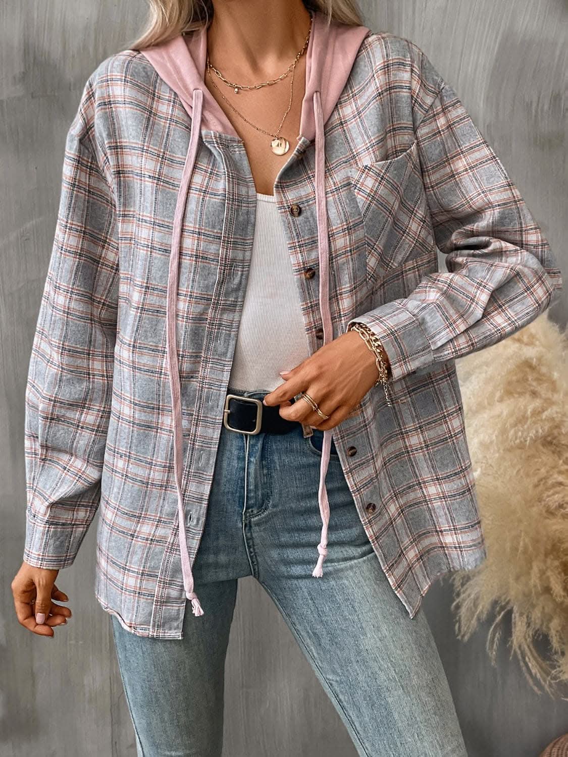 Plaid hooded jacket with pockets, buttoned design, unlined, cotton-polyester blend.