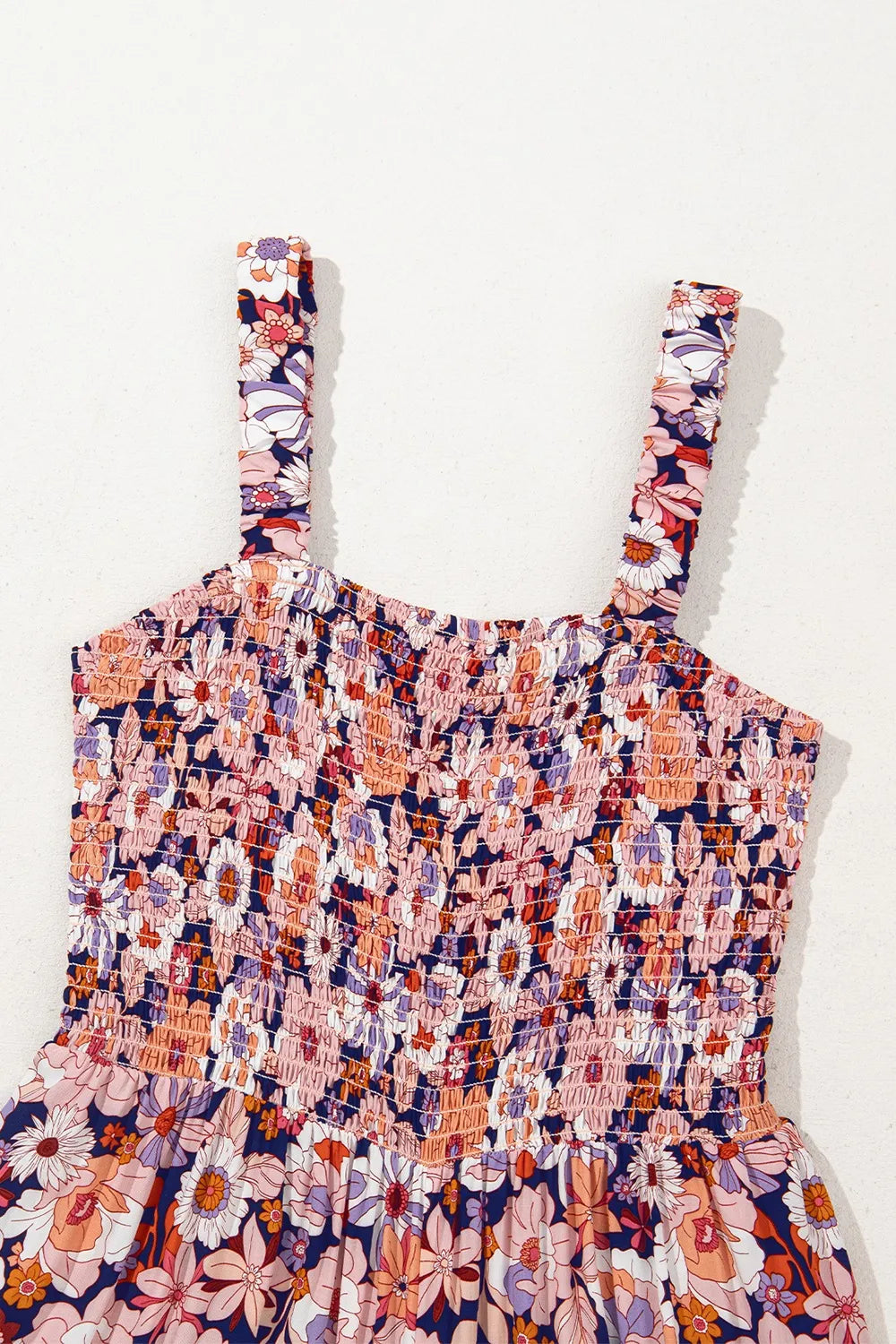 Bloom & Breeze Floral Smocked Jumpsuit