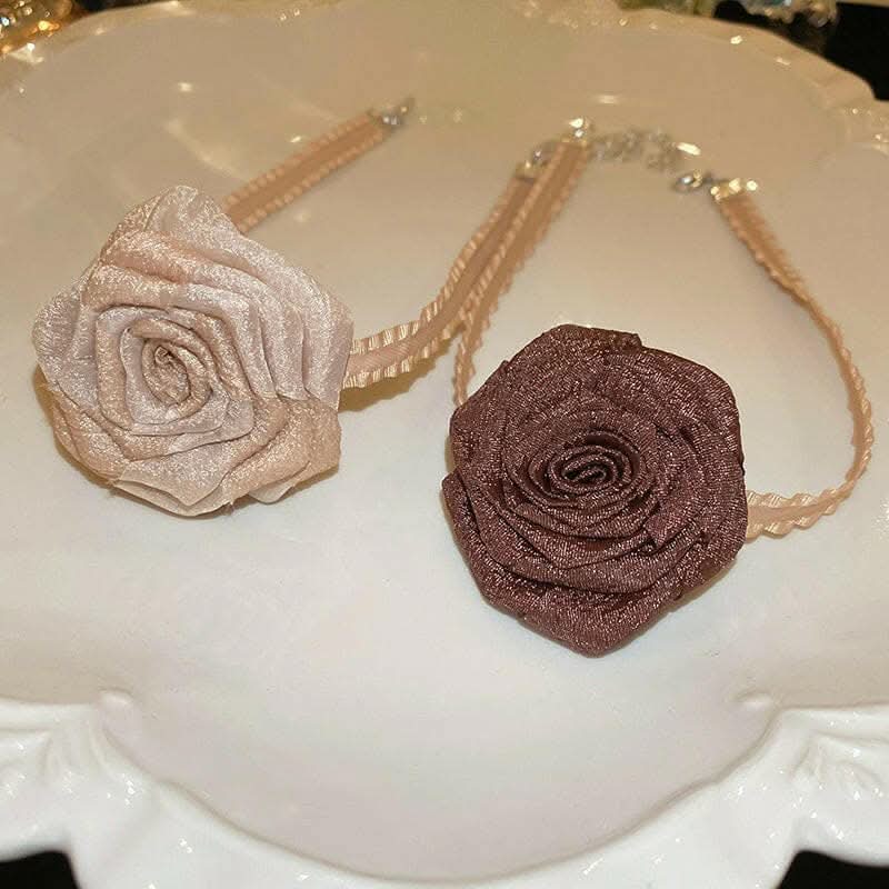 Elegant 3D rose alloy charm necklace with intricate design and adjustable chain.