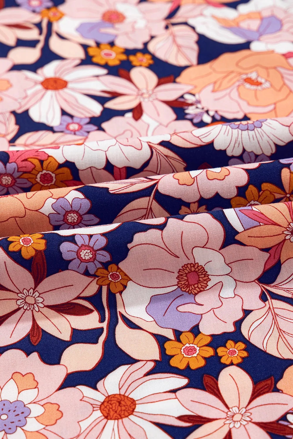 Bloom & Breeze Floral Smocked Jumpsuit