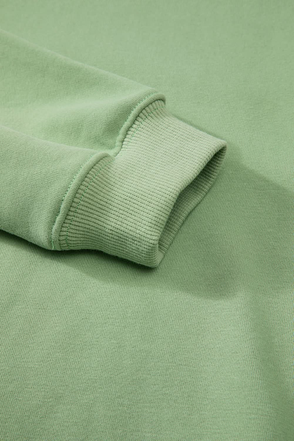 Cozy fleece-lined sweatshirt in smoke green - Love Salve