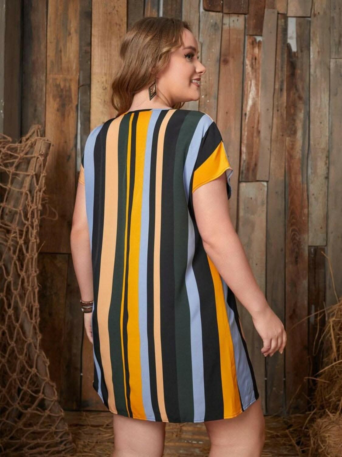 Striped Plus Size Mini Dress with Short SleevesUpgrade Your Style with Our Striped Plus Size Mini Dress!
Chic Design: Embrace elegance in our striped mini dress with short sleeves, perfect for any occasion.
Love Salve Size Mini Dressplus