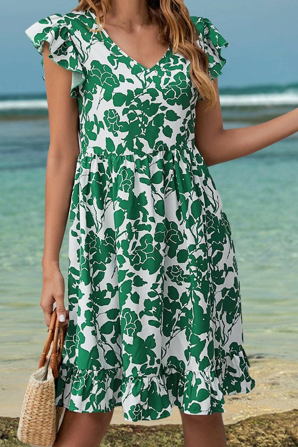 Ruffled V-Neck Cap Sleeve Dress with Floral PrintRuffled V-Neck Cap Sleeve Dress with Floral Print
Chic Design: Step into elegance with delicate ruffled accents and a flattering V-neck.
Flirty Details: The plLove Salve -Neck Cap Sleeve DressColor