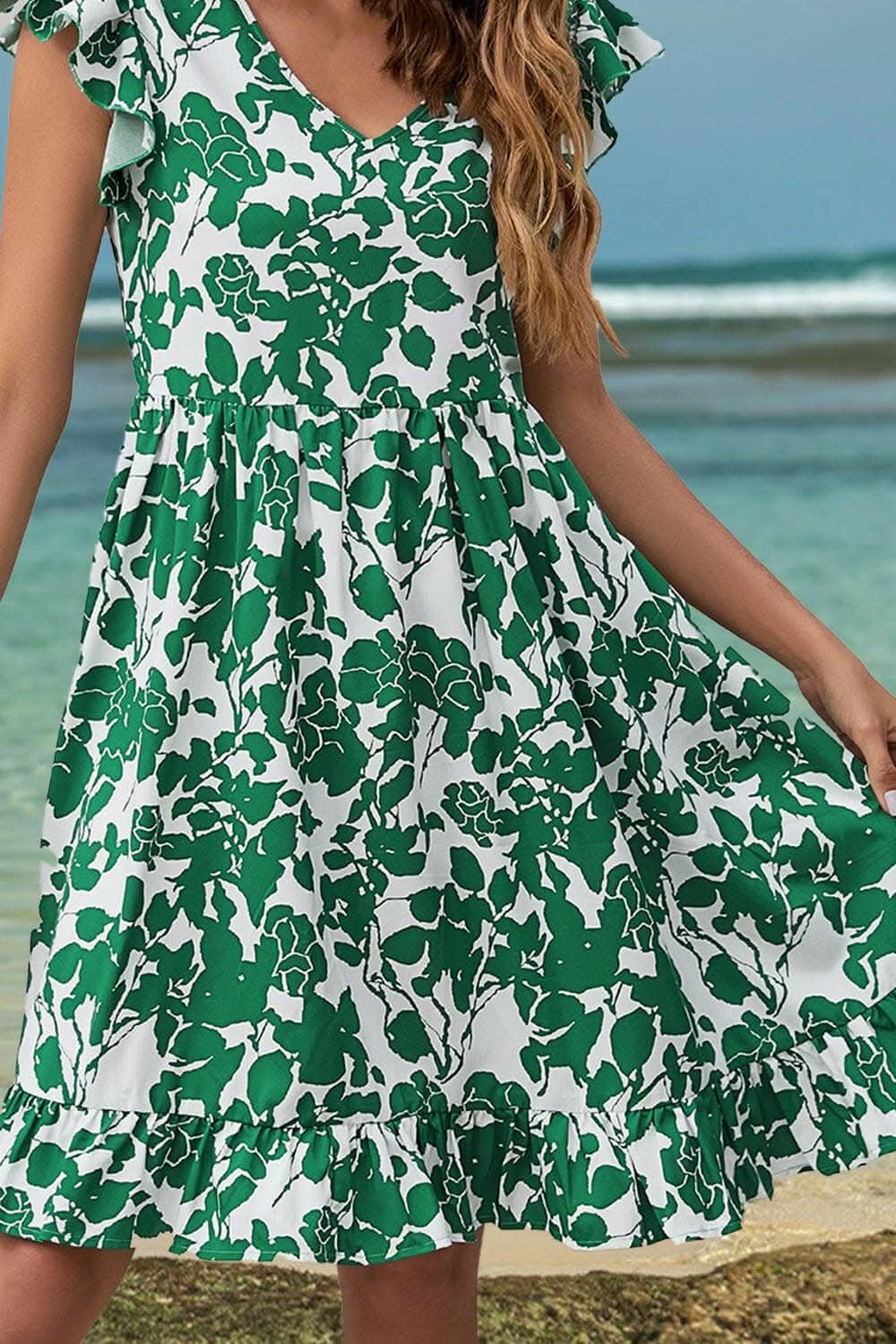 Ruffled V-Neck Cap Sleeve Dress with Floral PrintRuffled V-Neck Cap Sleeve Dress with Floral Print
Chic Design: Step into elegance with delicate ruffled accents and a flattering V-neck.
Flirty Details: The plLove Salve -Neck Cap Sleeve DressColor