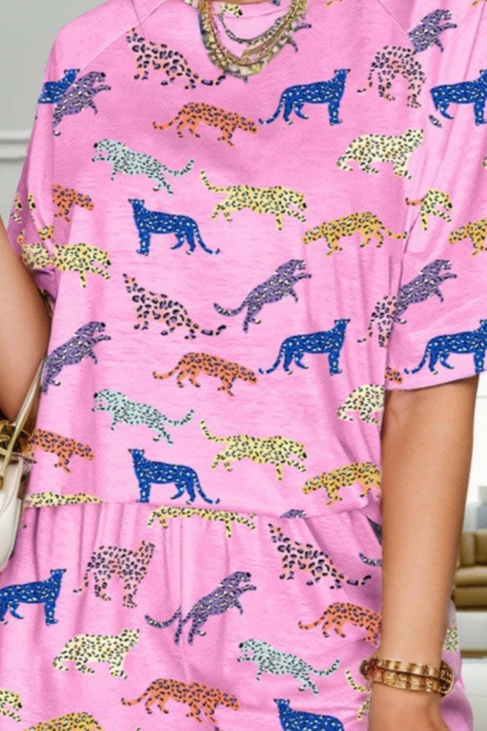 Wilderness Vibes Lounge EnsembleUnleash Your Wild Spirit with the Wilderness Vibes Lounge Ensemble
Indulge in the perfect blend of style and comfort with our Animal Round Neck Top and Shorts LoungLove Salve Wilderness Vibes Lounge Ensemblelounge