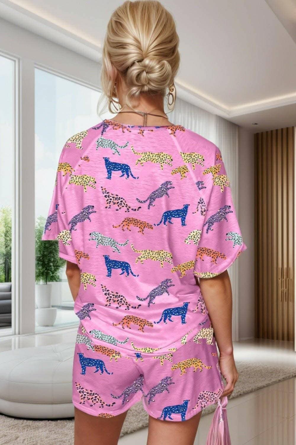 Wilderness Vibes Lounge EnsembleUnleash Your Wild Spirit with the Wilderness Vibes Lounge Ensemble
Indulge in the perfect blend of style and comfort with our Animal Round Neck Top and Shorts LoungLove Salve Wilderness Vibes Lounge Ensemblelounge
