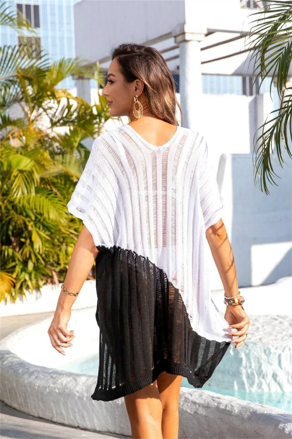 Vibrant V-Neck Sheer Cover UpVibrant V-Neck Sheer Cover Up
Upgrade your beach look with the Vibrant V-Neck Sheer Cover Up! Embrace sheer elegance and channel your inner goddess with its slit shLove Salve -Neck Sheer Coverswimwear