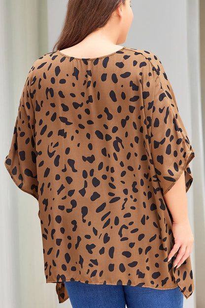 Plus Size Animal Print Handkerchief Hem Blouse.