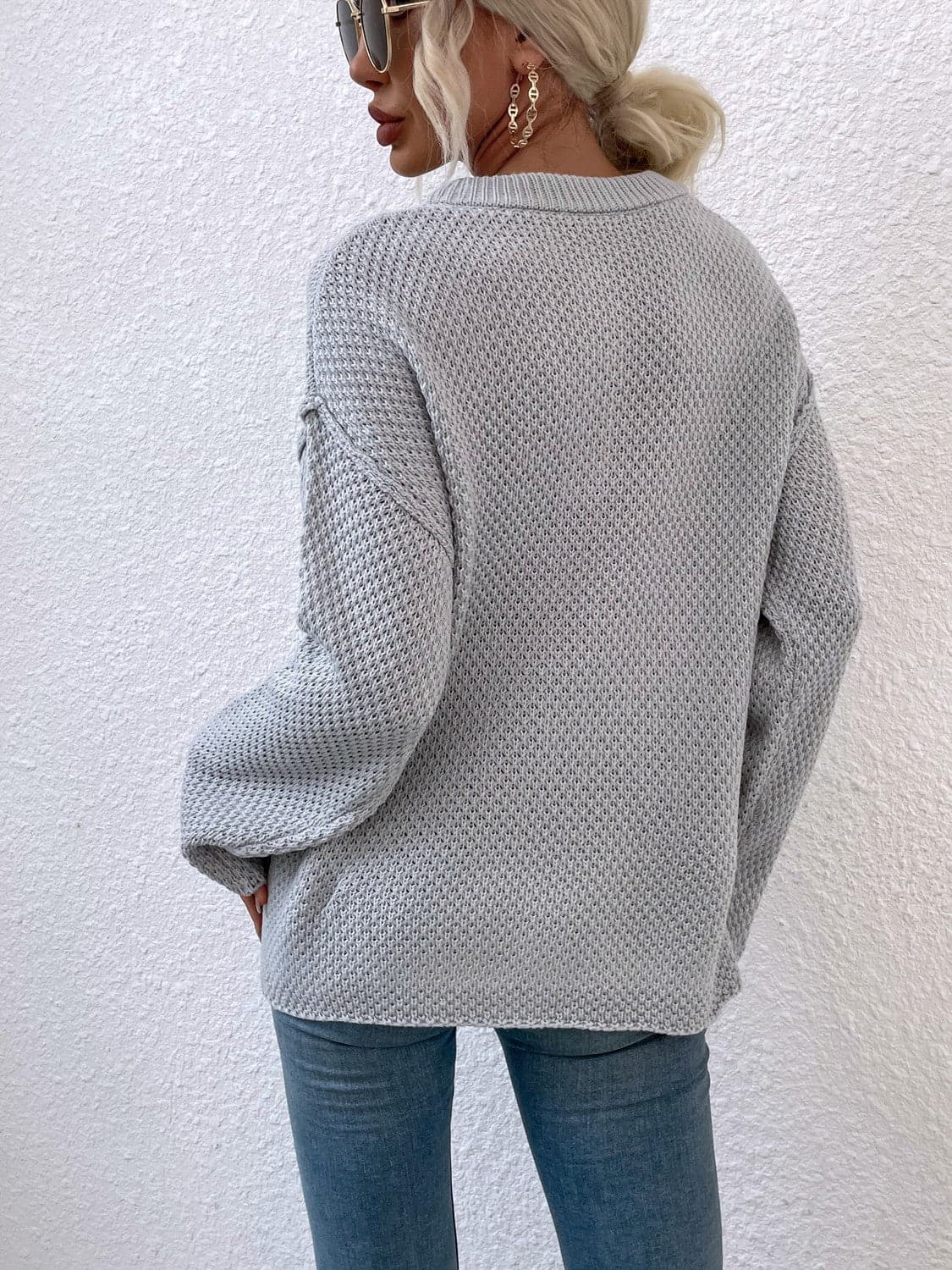 Quarter-Button Slit Sweater.