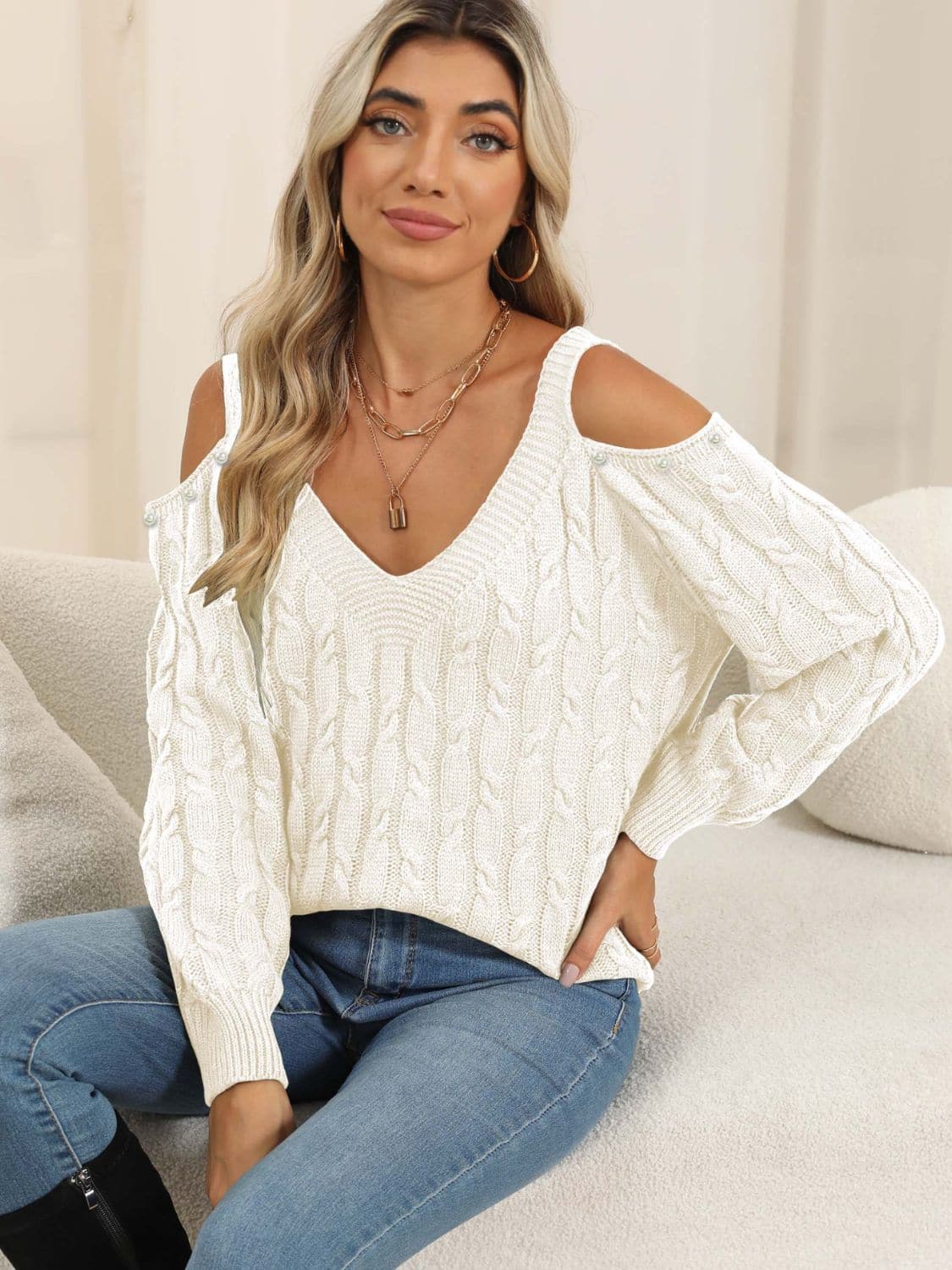 Chic cold shoulder cable-knit sweater