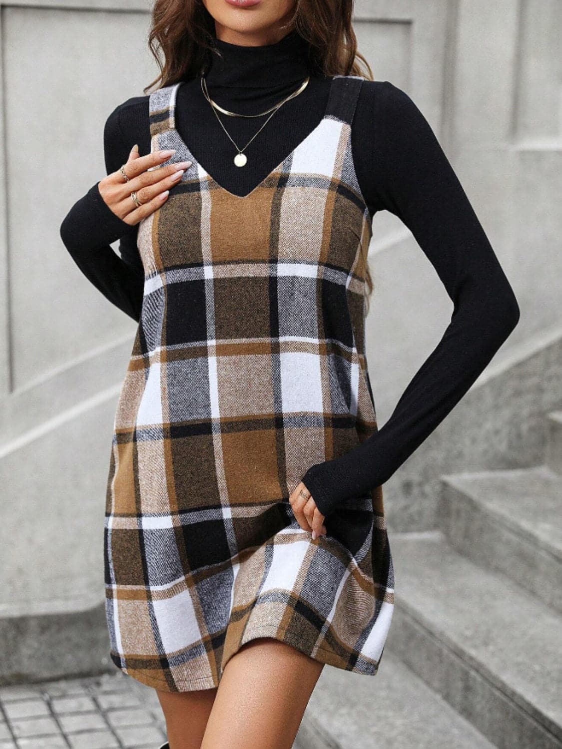 Plaid V-neck dress with wide straps and a flattering fit