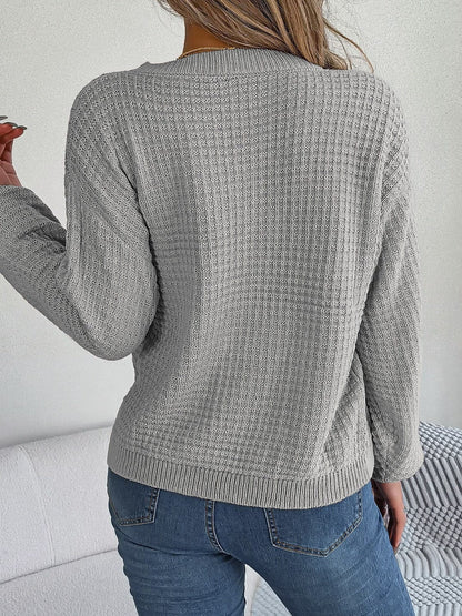 Cable-Knit Round Neck Long Sleeve Sweater.