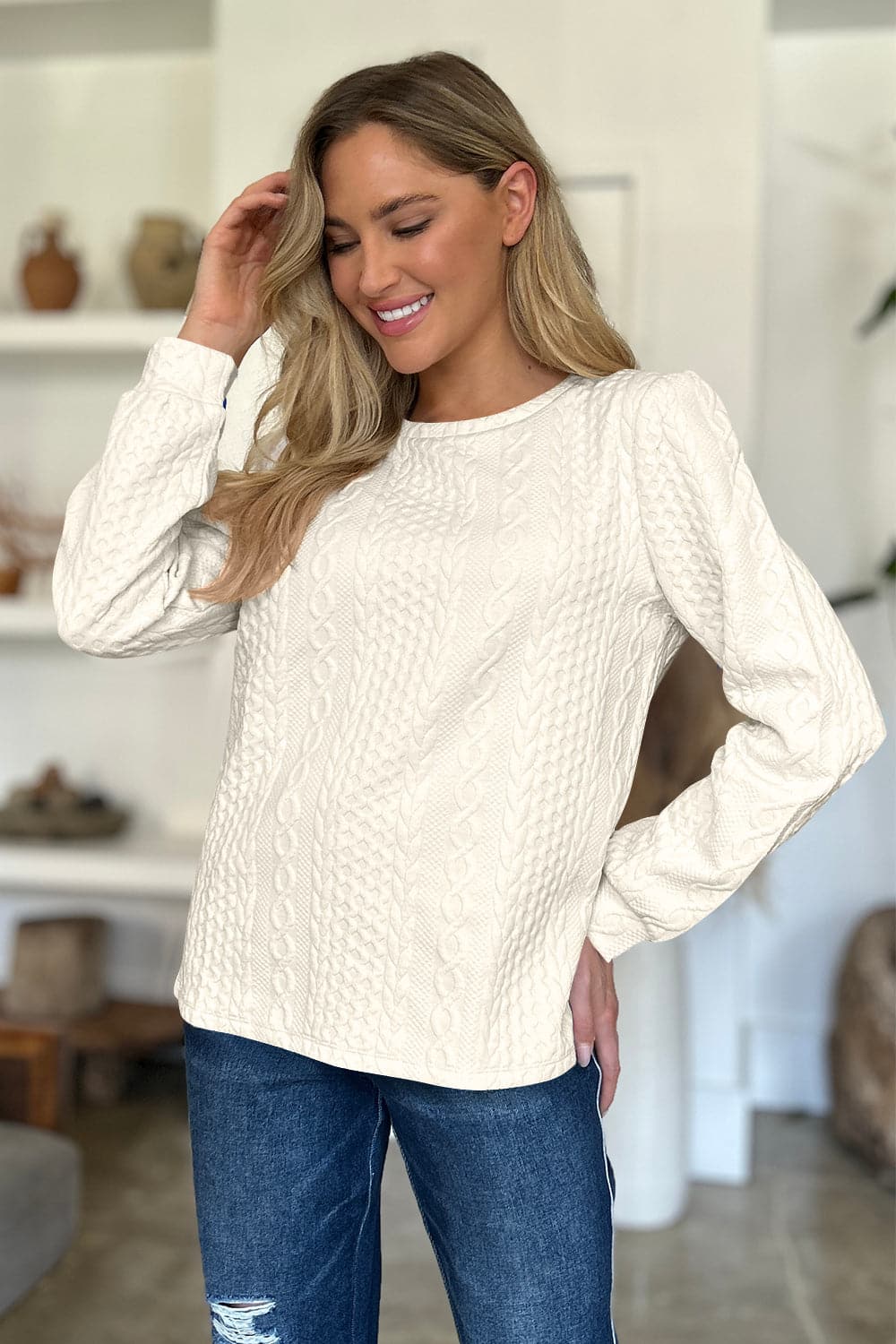 Textured Round Neck Long Sleeve Sweatshirt.