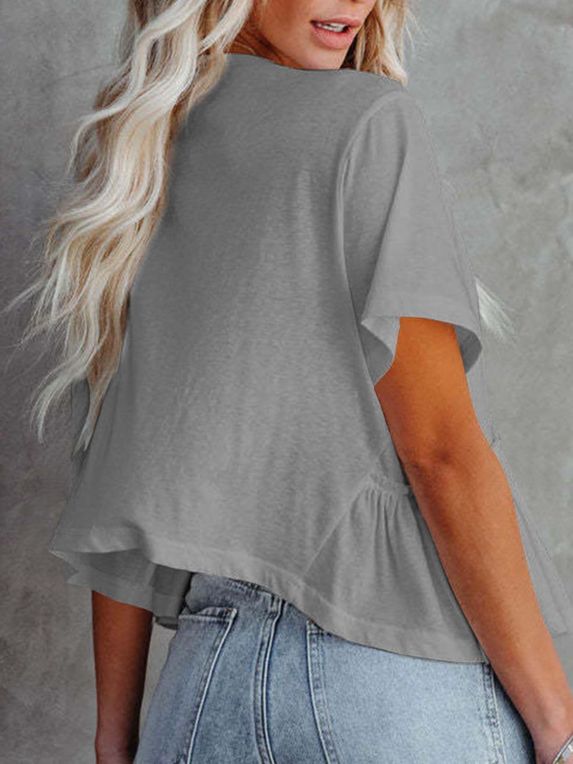 Tied Plunge Short Sleeve Blouse.