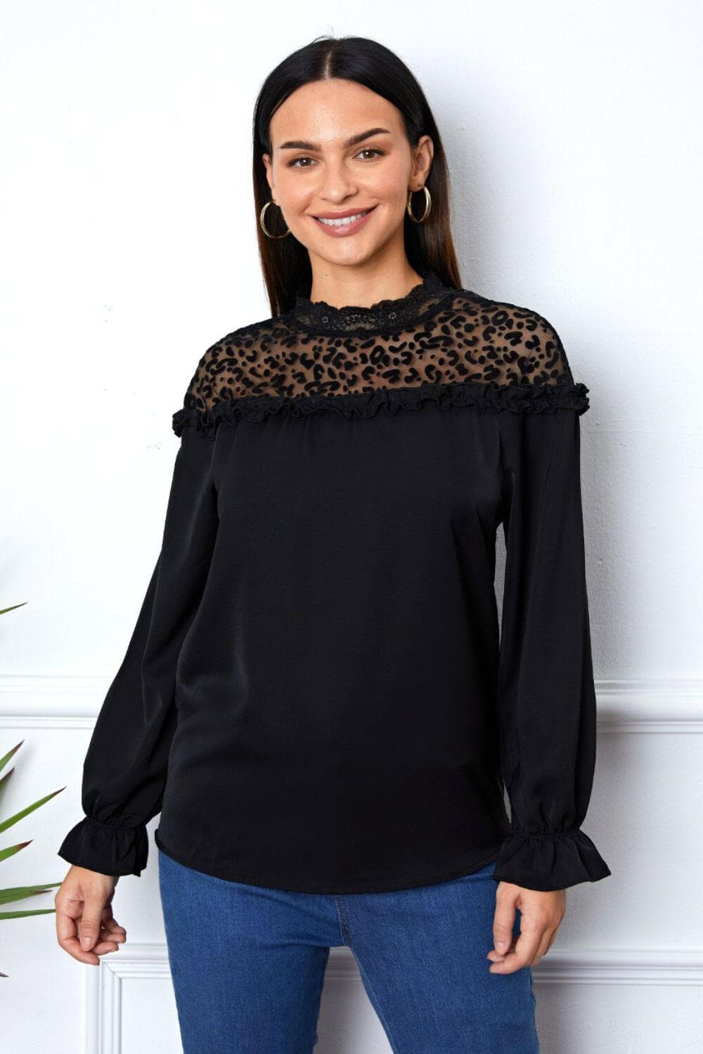 Leopard frill sleeve blouse with flounce sleeves and leopard print.