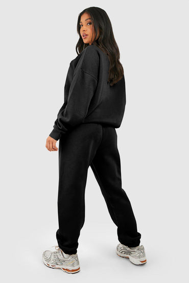 Chic black half zip tracksuit with ribbed edges for ultimate comfort