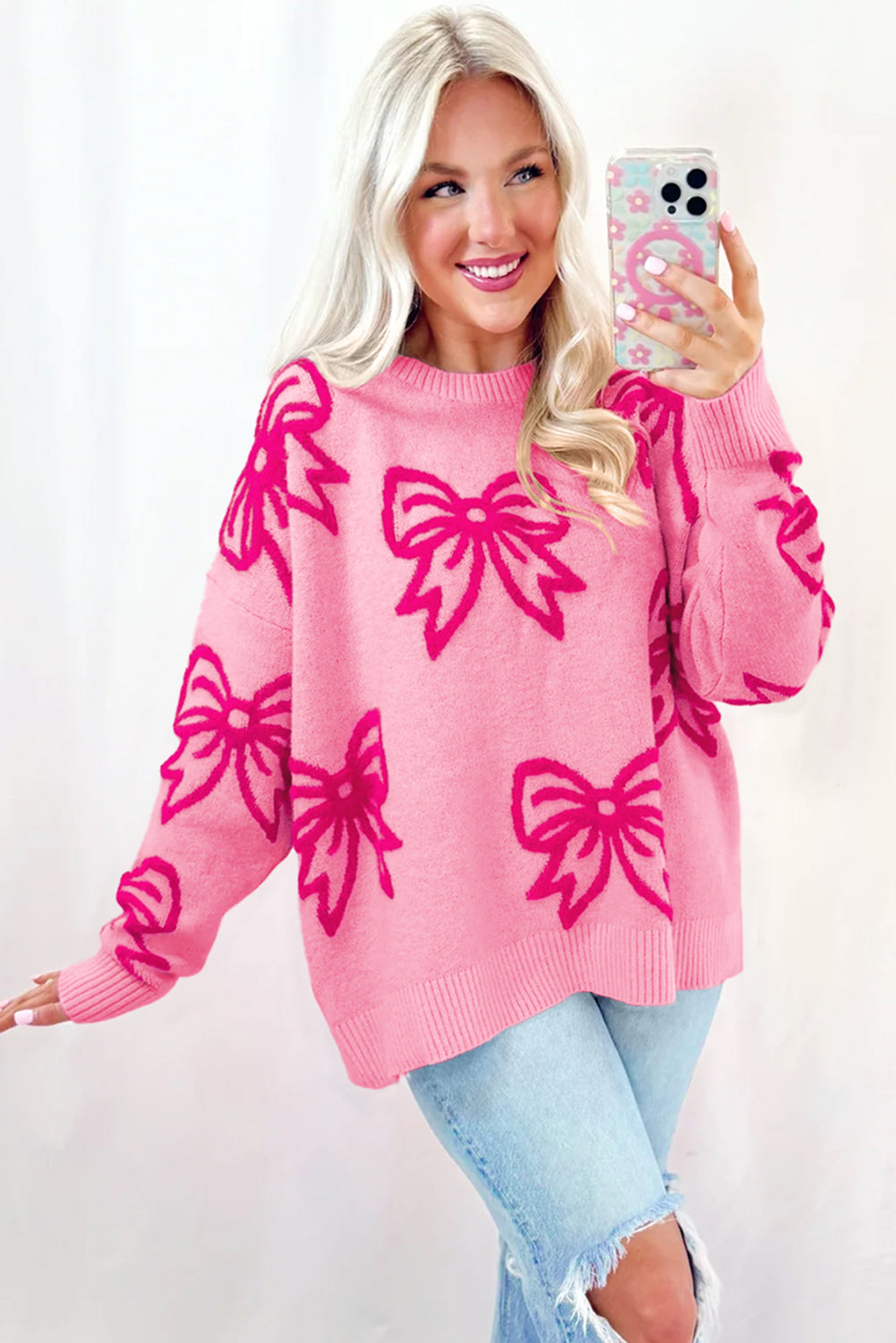 Feminine Pink Bow Print Loose Fit Sweater with Drop Shoulders